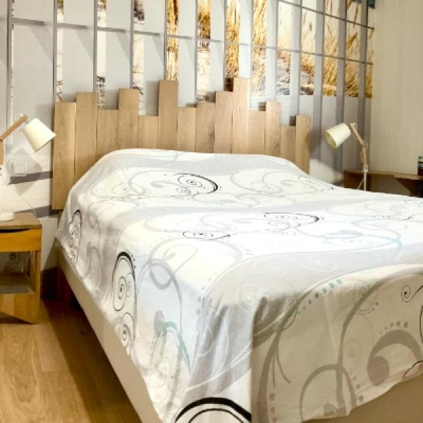 Tête de lit palissade en bois